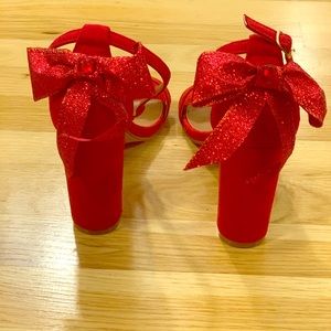 Festive red heels with bow